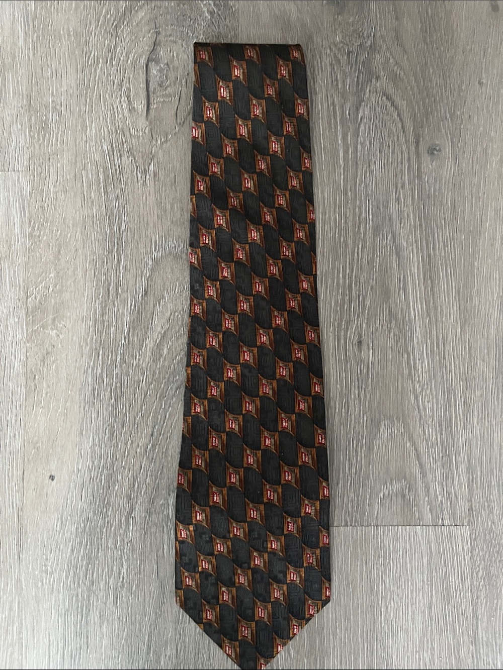 Ferrell Reed for Belk Black Tie with Brown/red Geometric Pattern
